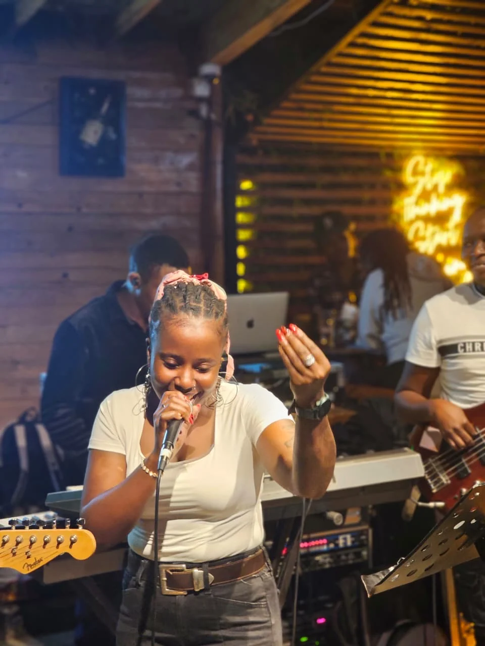Event MC hosting with a microphone on stage