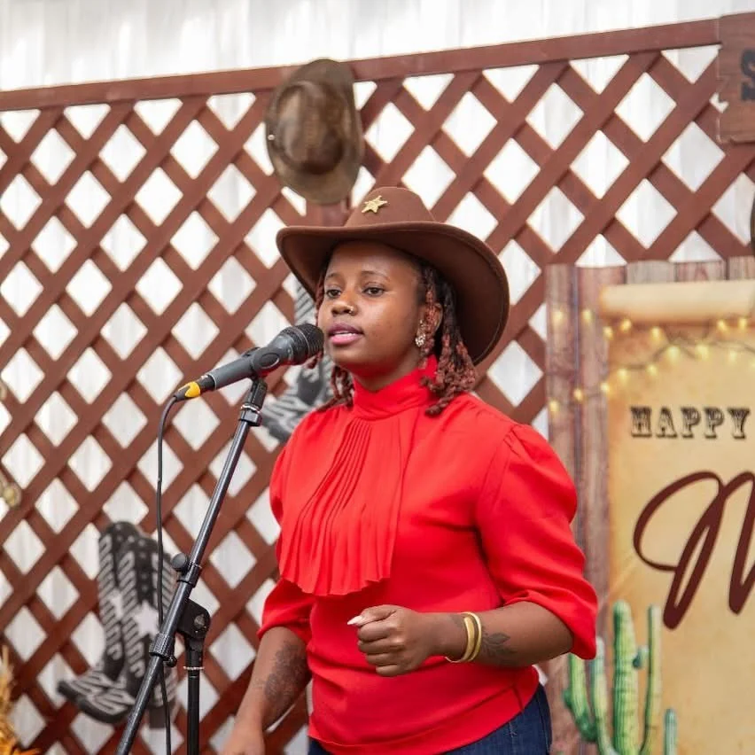 Singer performing at a karaoke and open-mic night with a microphone